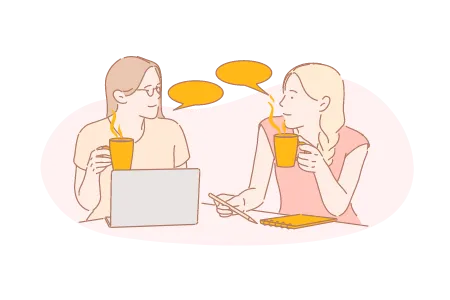 two woman talking with each other holding coffee cups